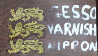 Photo of the sign sized with artists gesso