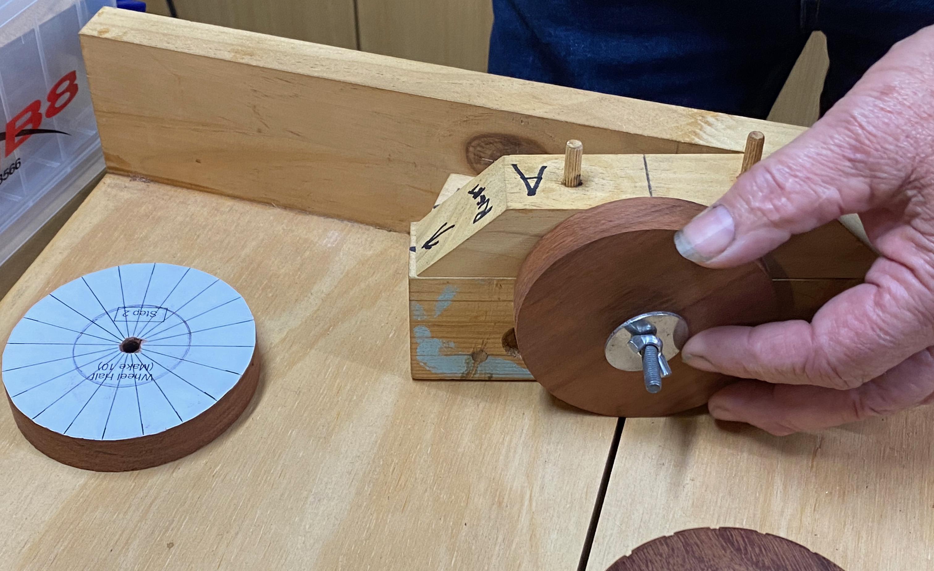 Photo of a closeup of how the grooves are cut using a tablesaw sled and a custom jig